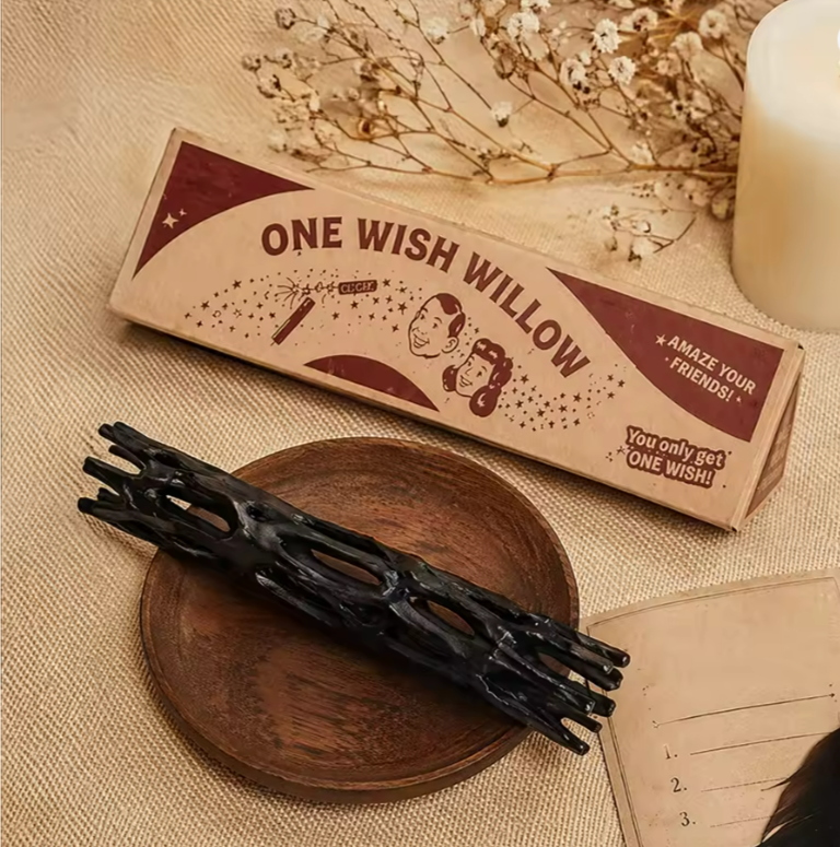 One Wish Willow prop beside vintage packaging with dried flowers and candlelight